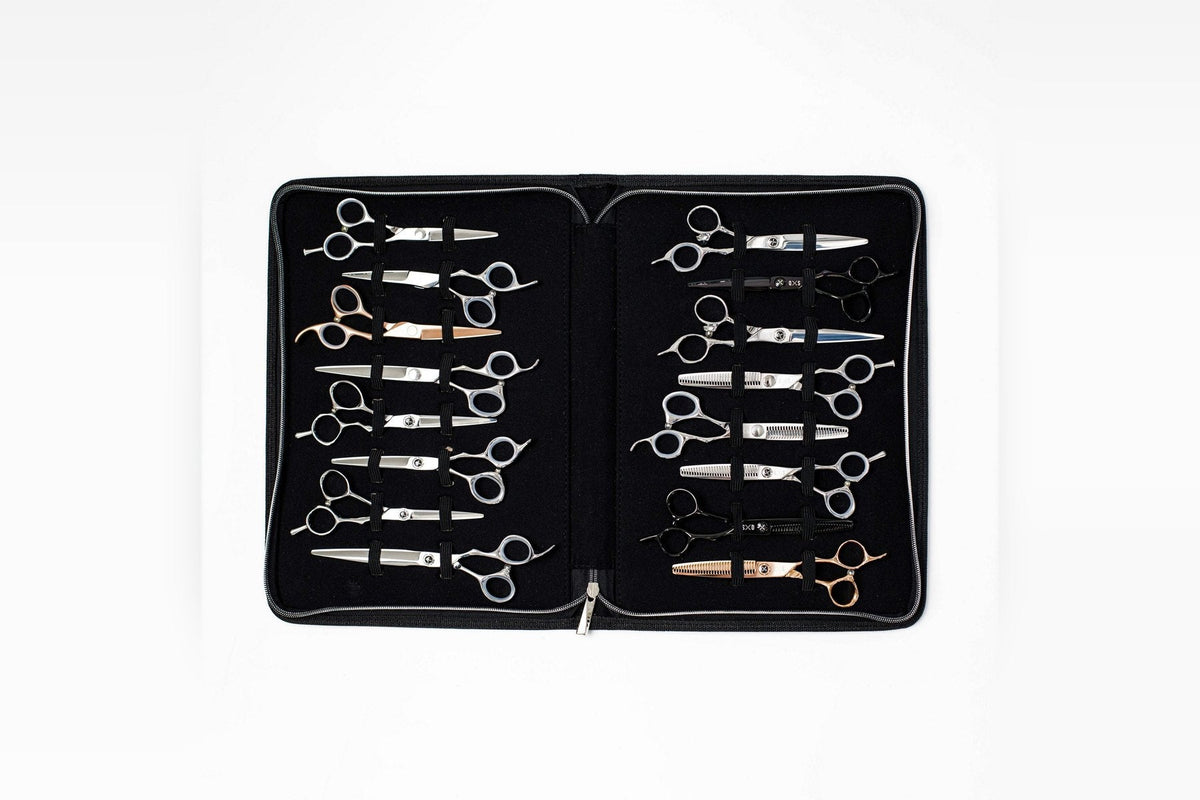 A full set of professional scissors in a zipped case